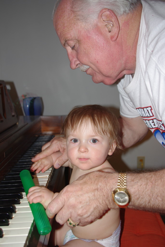 Popop trying to teach Finn the piano